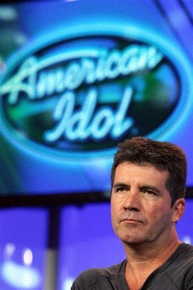 **FILE PHOTO** 'American Idol' judge Simon Cowell listens to a question during the 2007 Fox Winter Press Tour, Jan. 20, 2007, in Pasadena, Calif. (AP Photo/Rene Macura)