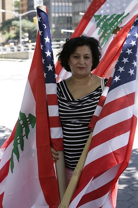 A Lebanese-American protester stands outside of the UN  building ...
