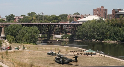 Helicopters carrying First Lady Laura Bush and her staff land near the site of the Minneapolis, MN bridge collapse on August 3. (Photo and caption submitted by Emily Marsden)