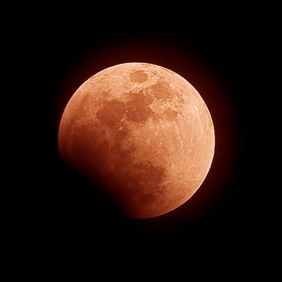 The February 20 lunar eclipse glows red above Westwood, MA. ...